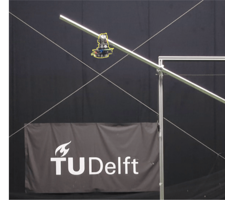 Perched on a steeply inclined cylindrical target