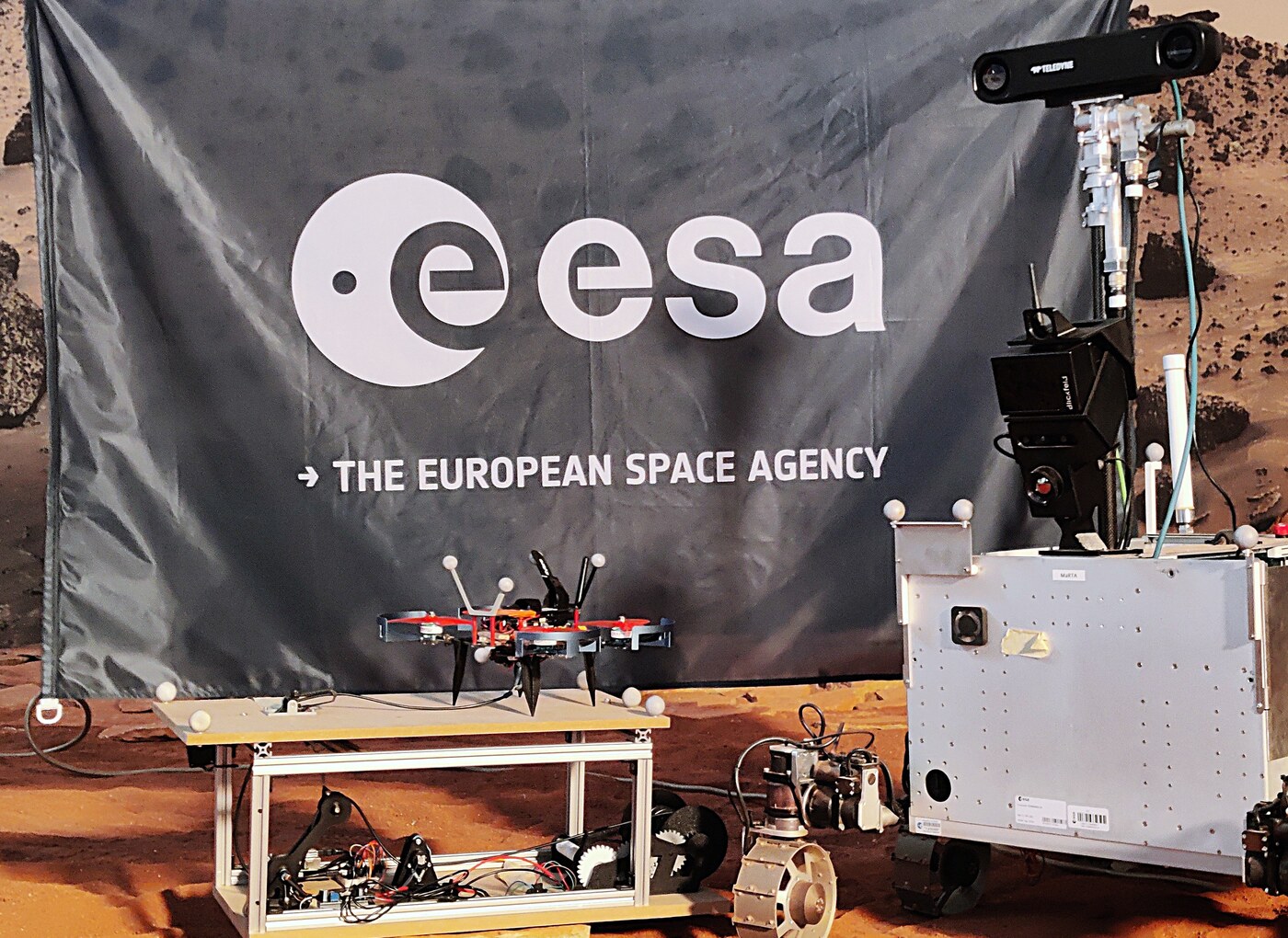 Tether Management System with the QAV250 drone next to the rover in the ESA Mars yard